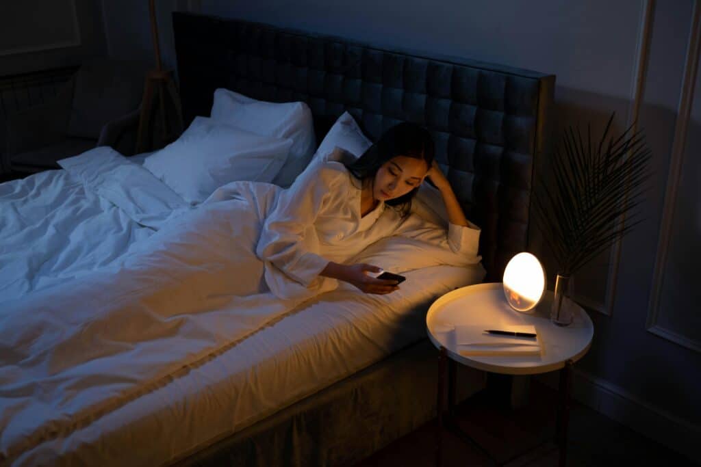 Woman with insomnia, a symptom of how cortisol affects the body
